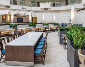 comfortable lobby lounge area ideal as a coworking space at Embassy Suites by Hilton Seattle Tacoma International Airport.