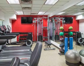 Fitness center with treadmills and machines at the Hilton Chicago-Northbrook.