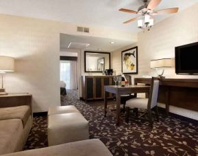 Living room in a hotel suite perfect as workspace at the Embassy Suites by Hilton Napa Valley.