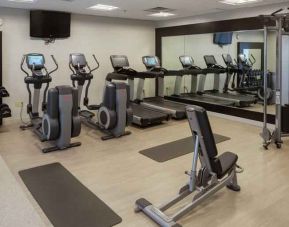 Fitness center with treadmills and machines at the Hilton Birmingham at UAB.