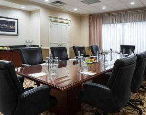 Elegant meeting room with comfortable chairs at the DoubleTree Suites by Hilton Cincinnati-Blue Ash.