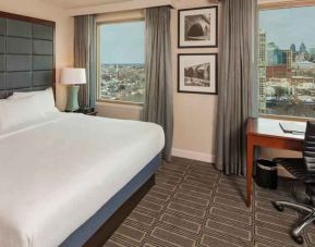 King-bedroom with desk at the Hilton Philadelphia at Penn's Landing.