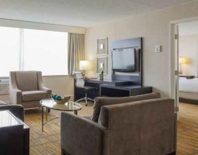 King suite with living room and bedroom at the DoubleTree by Hilton Rochester.