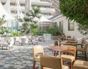 Outdoor patio perfect as workspace at the DoubleTree by Hilton Rochester.