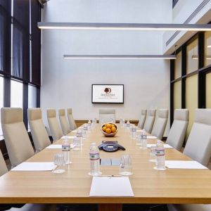 Small meeting room with TV screen at the DoubleTree by Hilton Washington DC - Crystal City.