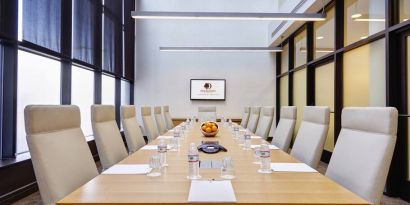 Small meeting room with TV screen at the DoubleTree by Hilton Washington DC - Crystal City.
