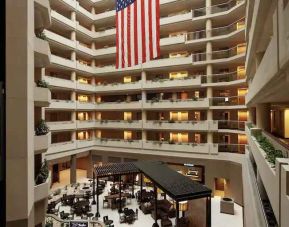 Aerial view of a hotel workspace at the Embassy Suites by Hilton Crystal City National Airport.