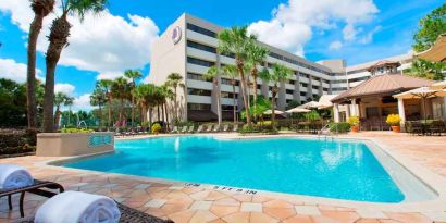 Relaxing outdoor pool at the DoubleTree Suites by Hilton Orlando - Disney Springs Area.