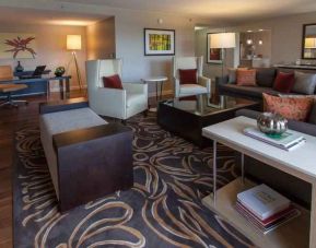 Spacious presidential suite with working station at the DoubleTree by Hilton Pittsburgh Green Tree.