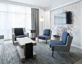 Elegant living room with working station at the Canopy by Hilton Washington DC The Wharf.