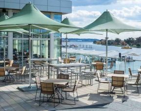 Outdoor workspace overlooking the wharf at the Canopy by Hilton Washington DC The Wharf.