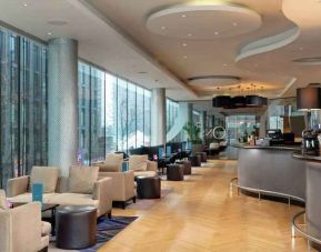 Comfortable lobby workspace with sofas at the Hilton London Wembley.