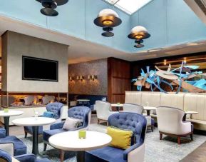 Spacious lobby workspace with lounges, chairs and tables at the Hilton London Bankside.