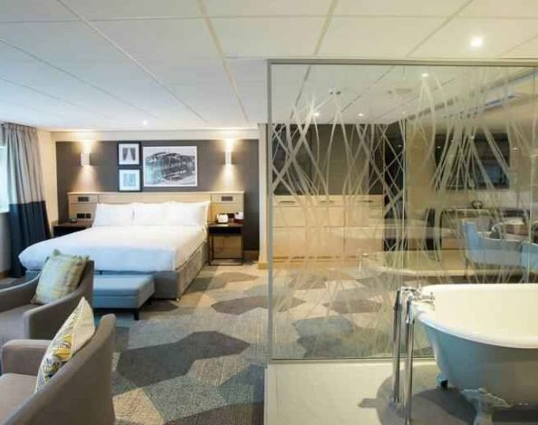Beautiful and spacious king suite with bath tub at the DoubleTree by Hilton Coventry Building Society Arena.