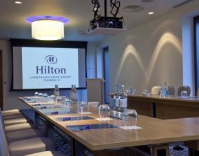 Meeting room with u shape table at the Hilton London Heathrow Airport Terminal 5.