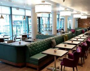 Dining area perfect for co-working at the Hilton Garden Inn Birmingham Brindleyplace.