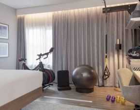 Hotel room with fitness corner at the DoubleTree by Hilton London Angel Kings Cross.