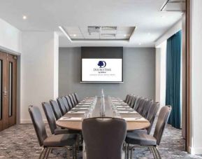 Small meeting room with TV screen at the DoubleTree by Hilton London Angel Kings Cross.