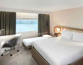Queen room with pullout single bed at the Hilton London Heathrow Airport.