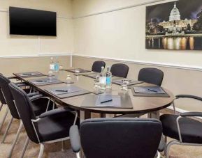 Small meeting room with TV screen at the DoubleTree by Hilton Manchester Airport.