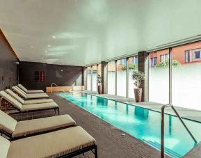 Relaxing indoor pool at the Fellows House Cambridge, Curio Collection by Hilton.