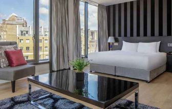 spacious king suite with city views at DoubleTree by Hilton London Greenwich.