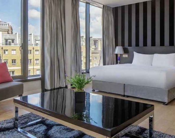 spacious king suite with city views at DoubleTree by Hilton London Greenwich.
