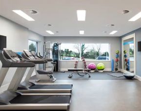 Fitness center with treadmills at the Hampton by Hilton Bristol Airport.