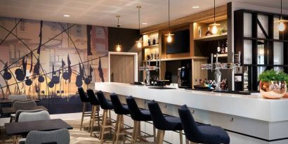 Hotel workspace along the bar at the Hampton by Hilton Bristol Airport.