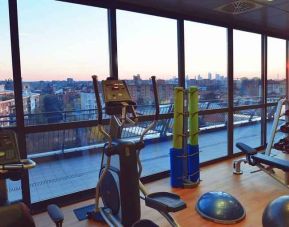 Fitness center with view at the Hilton Garden Inn Milan North.