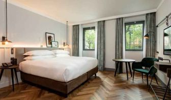 Bright king guestroom with working station at the DoubleTree by Hilton Rome Monti.