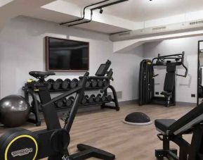 Fully equipped fitness center at the DoubleTree by Hilton Rome Monti.