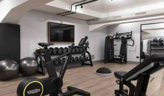 Fully equipped fitness center at the DoubleTree by Hilton Rome Monti.