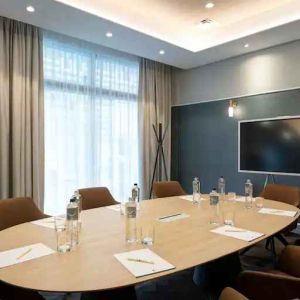 Small meeting room with round table at the DoubleTree by Hilton Rome Monti.