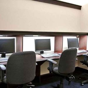 Professional business center with PC, phone, work desks, and printer ideal for working remotely at DoubleTree by Hilton Hotel Downtown Wilmington - Legal District.