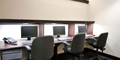 Professional business center with PC, phone, work desks, and printer ideal for working remotely at DoubleTree by Hilton Hotel Downtown Wilmington - Legal District.