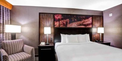 Beautiful king suite with lounge area at DoubleTree by Hilton Hotel Downtown Wilmington - Legal District.