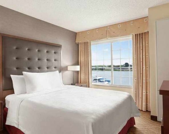 beautiful king room with TV and waterview at Homewood Suites by Hilton Oakland-Waterfront.