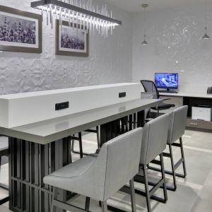 business center and coworking space equipped with work desks, PC, internet, and printers at Hampton Inn Irvine Spectrum Lake Forest.