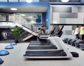 well equipped fitness center with treadmills and weights at Palmer House a Hilton Hotel.