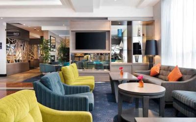 Comfortable lobby workspace with sofas at the Hilton Garden Inn Dublin Custom House.