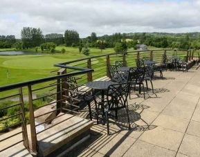 Outdoor terrace overlooking the golf field at the Hilton Belfast Templepatrick Golf & Country Club.