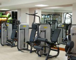 Fitness center with machines at the Hilton Dublin Airport.