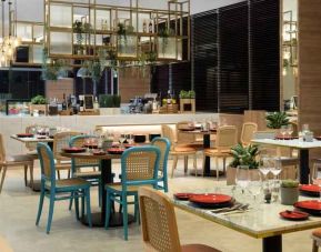 Dining area perfect for co-working at the Hilton Garden Inn Jakarta Taman Palem.
