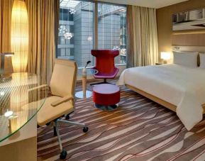 King bedroom with desk at the Hilton Frankfurt Airport.