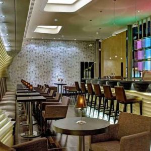 Stylish hotel workspace along the bar at the Hilton Frankfurt Airport.