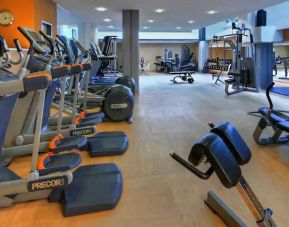 Fully equipped fitness center at the Hilton Cologne.