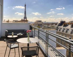 Hotel balcony overlooking the tour eiffel at the Canopy by Hilton Paris Trocadero.