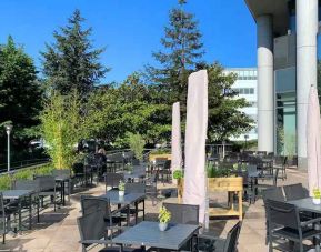 Outdoor patio perfect for co-working at the Hilton Paris Charles de Gaulle Airport.