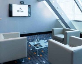 Hotel workspace with TV screen at the Hilton Paris La Defense.